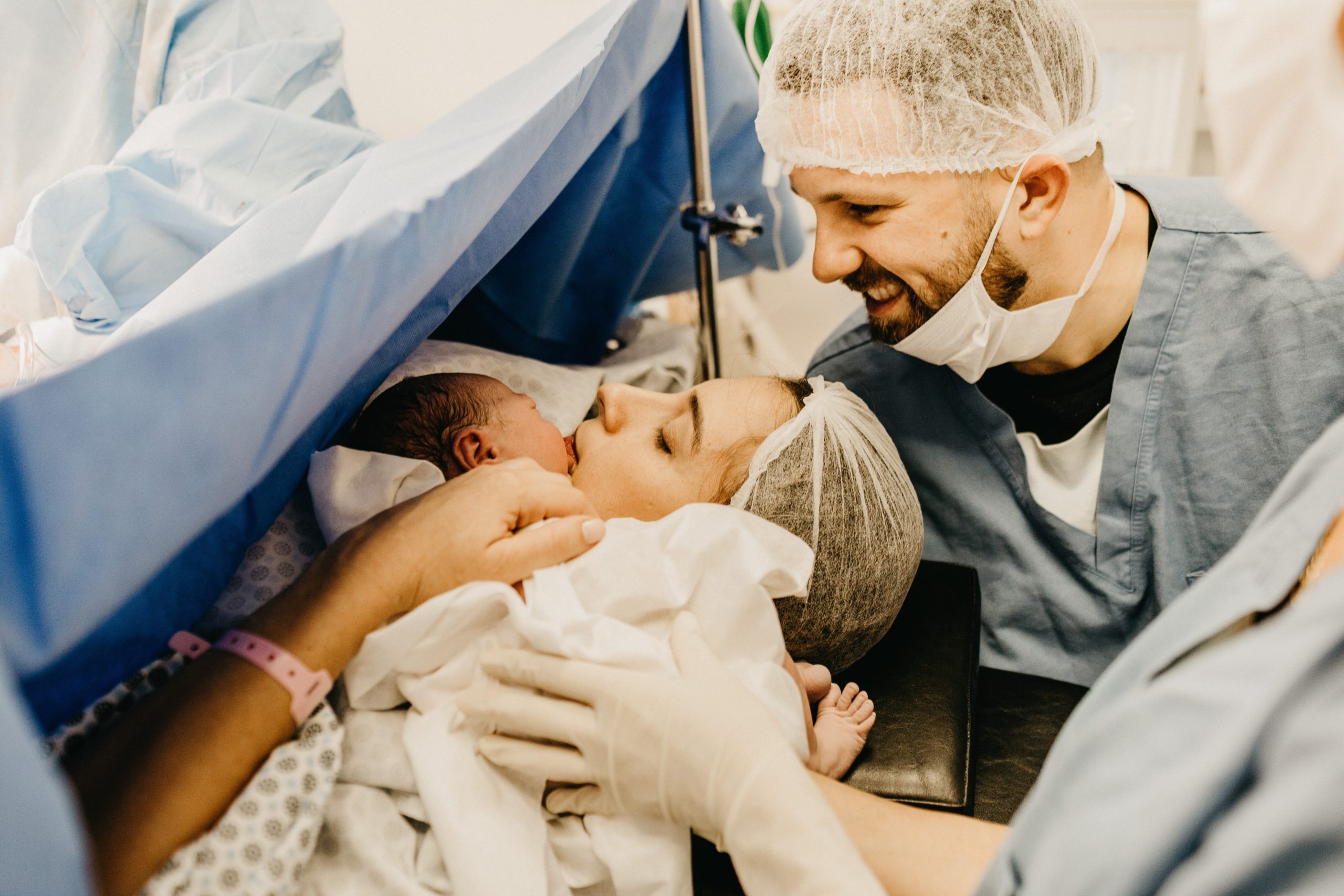 Labor and delivery nurse delivers a newborn baby