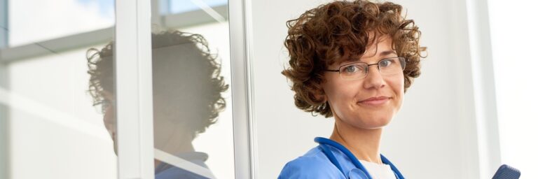 nurse holding smartphone