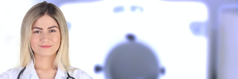 Woman Wearing White Medical Uniform and Stethoscope