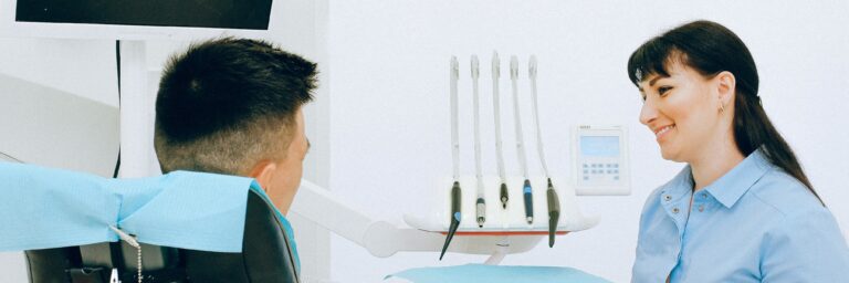 cheerful nurse talking to patient